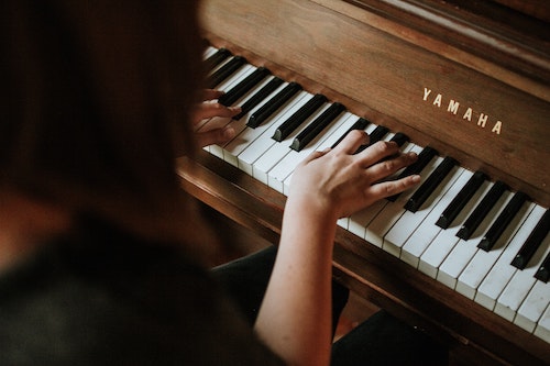 playing a yamaha piano